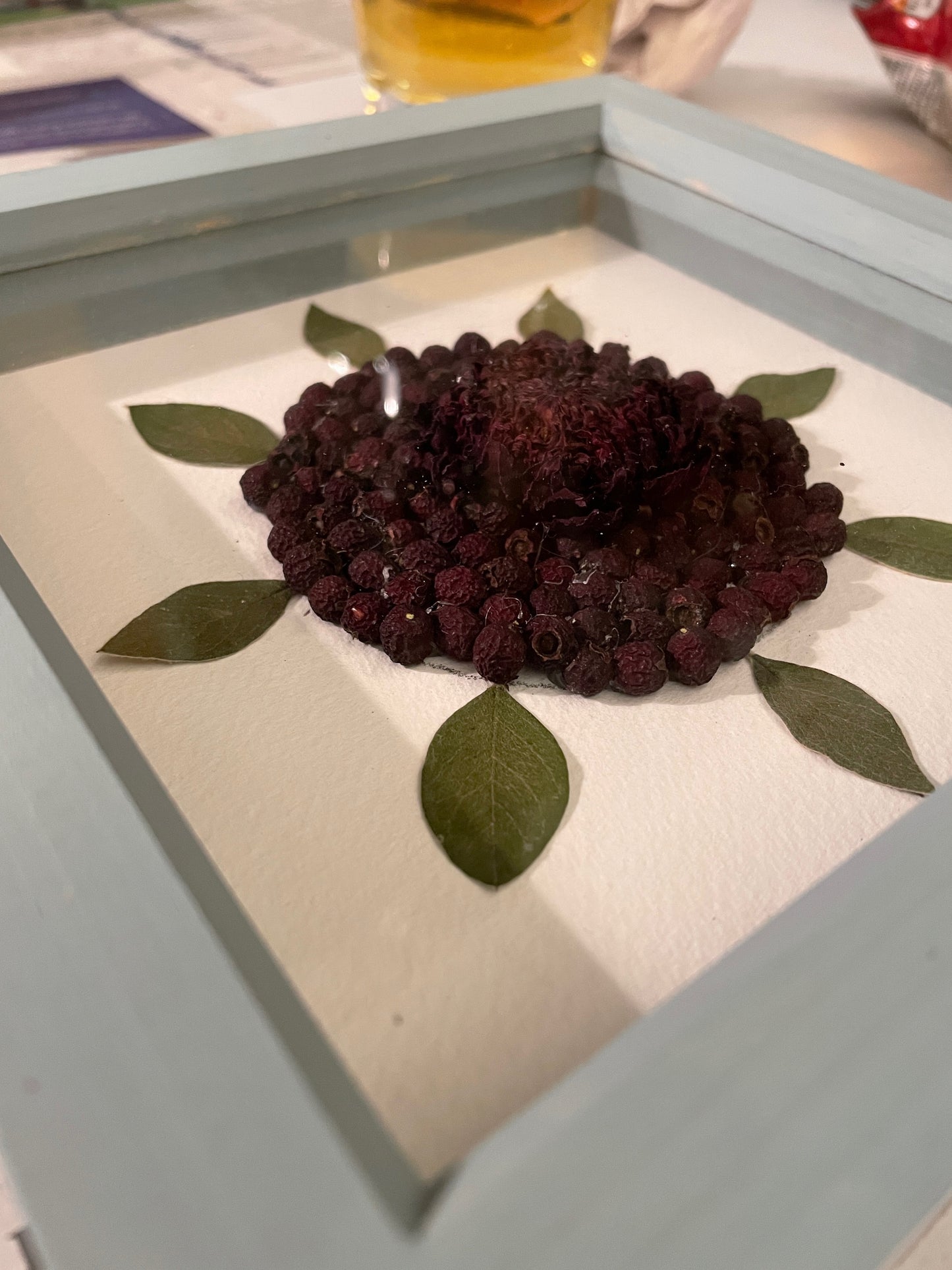 Small box frame with dahlia and berries