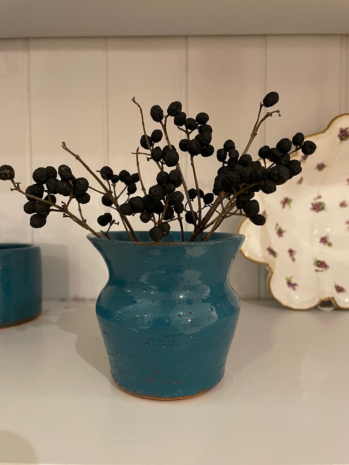Small fluted hand thrown vase
