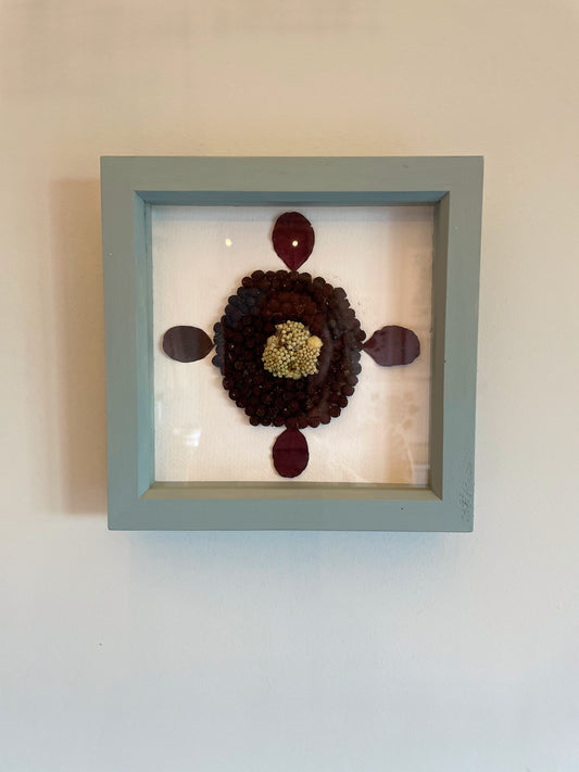Small box frame with Fatsia and berries