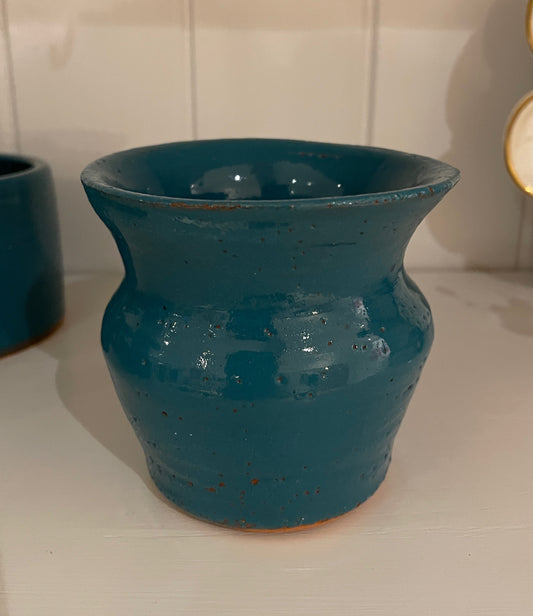 Small fluted hand thrown vase