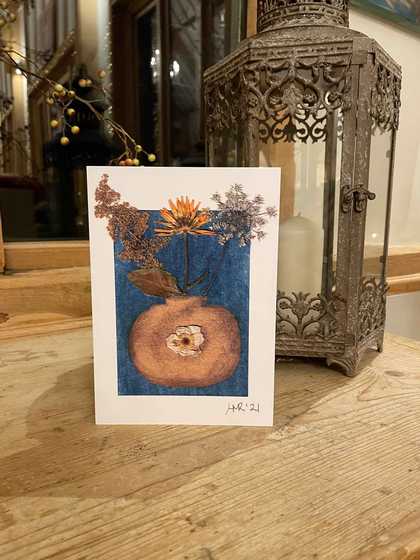 Gold painted vase greeting card with a yellow dandelion