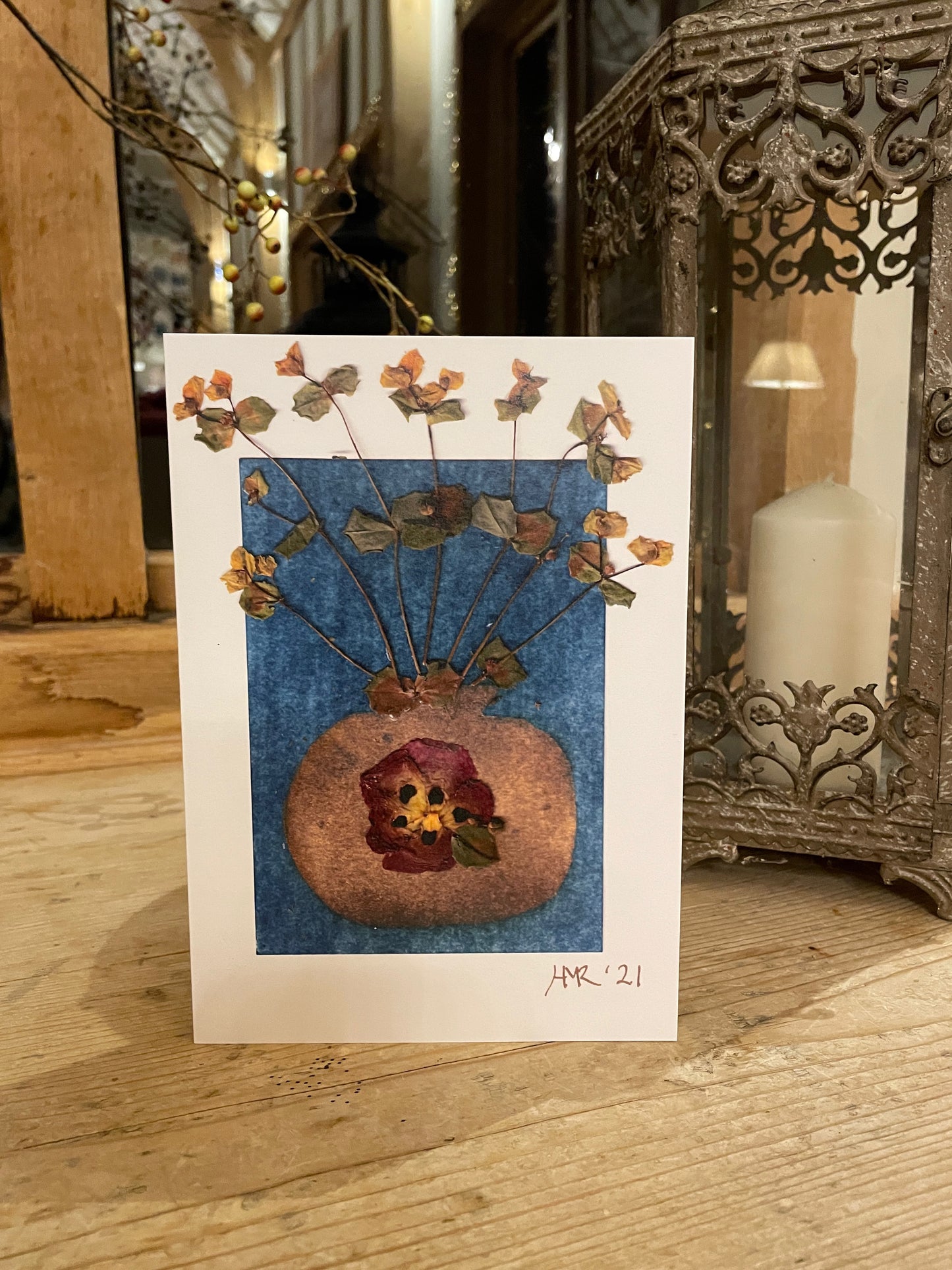 Gold vase with pressed flowers greeting card